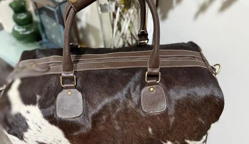 Cowhide duffle bag