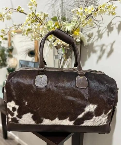 Cowhide duffle bag