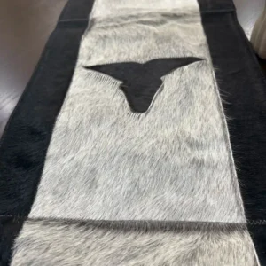 Cowhide bullhead table runner with bullhead patch, having leather fringes